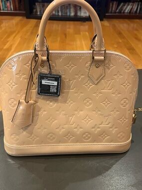 Pre-loved Louis Vuitton Nude Patent Vernis Alma Satchel